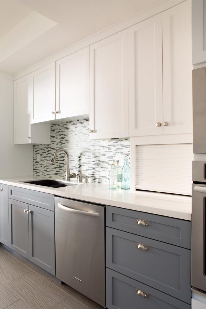Two tone grey and white kitchen cabinets